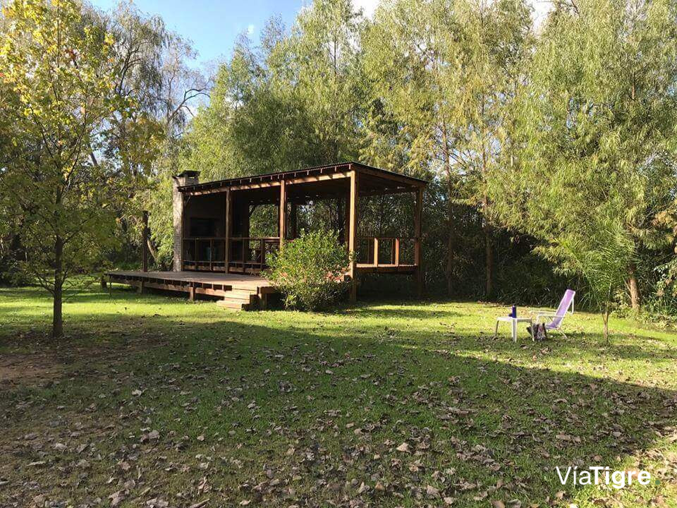 Quincho con parrilla y solarium